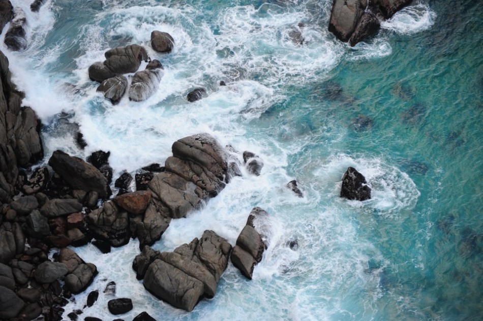 Waves Crash Agains the Rocks